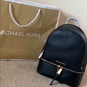 Michael Kors black leather backpack